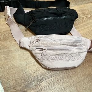 Two Reebok waist bags